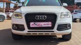 2013 Audi Q5 pearl white exterior with brown leather interior and sunroof.