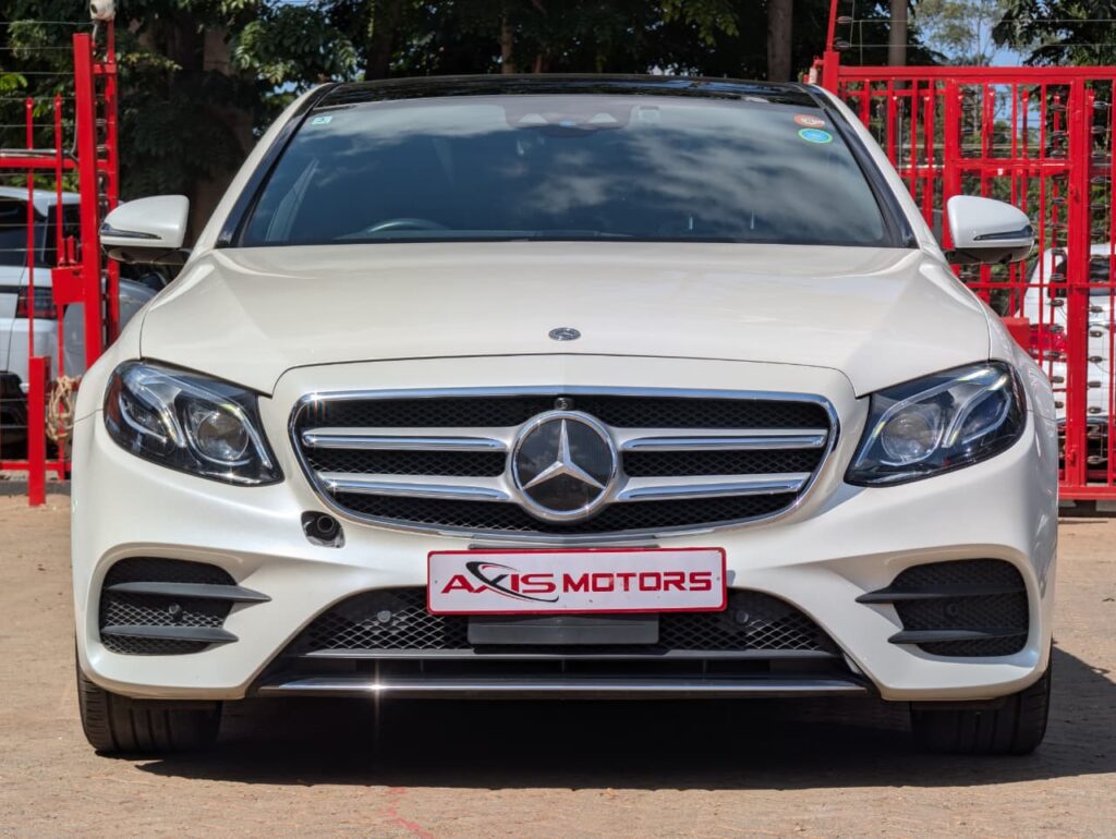 2018 Mercedes-Benz E200 pearl white exterior black leather interior panoramic sunroof luxury sedan